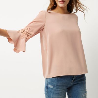 Pink crochet trim bell sleeve top